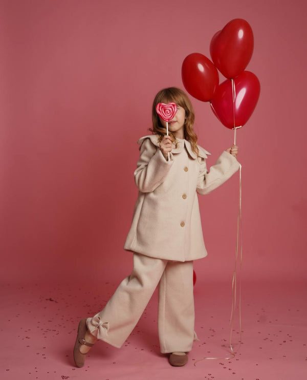 Pantalon evazat stofa ivoire cu funde