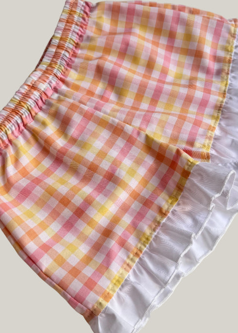 Pantaloni carouri roz si galben cu volane