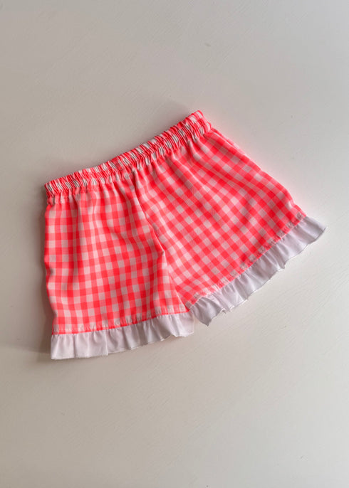 Pantaloni scurti cu carouri roz neon si volane