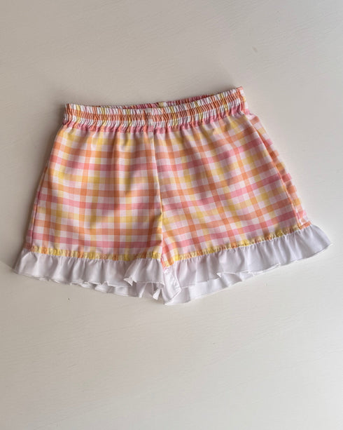 Pantaloni carouri roz si galben cu volane