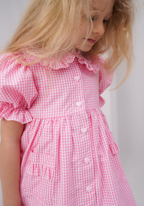 Rochie in carouri roz cu volane