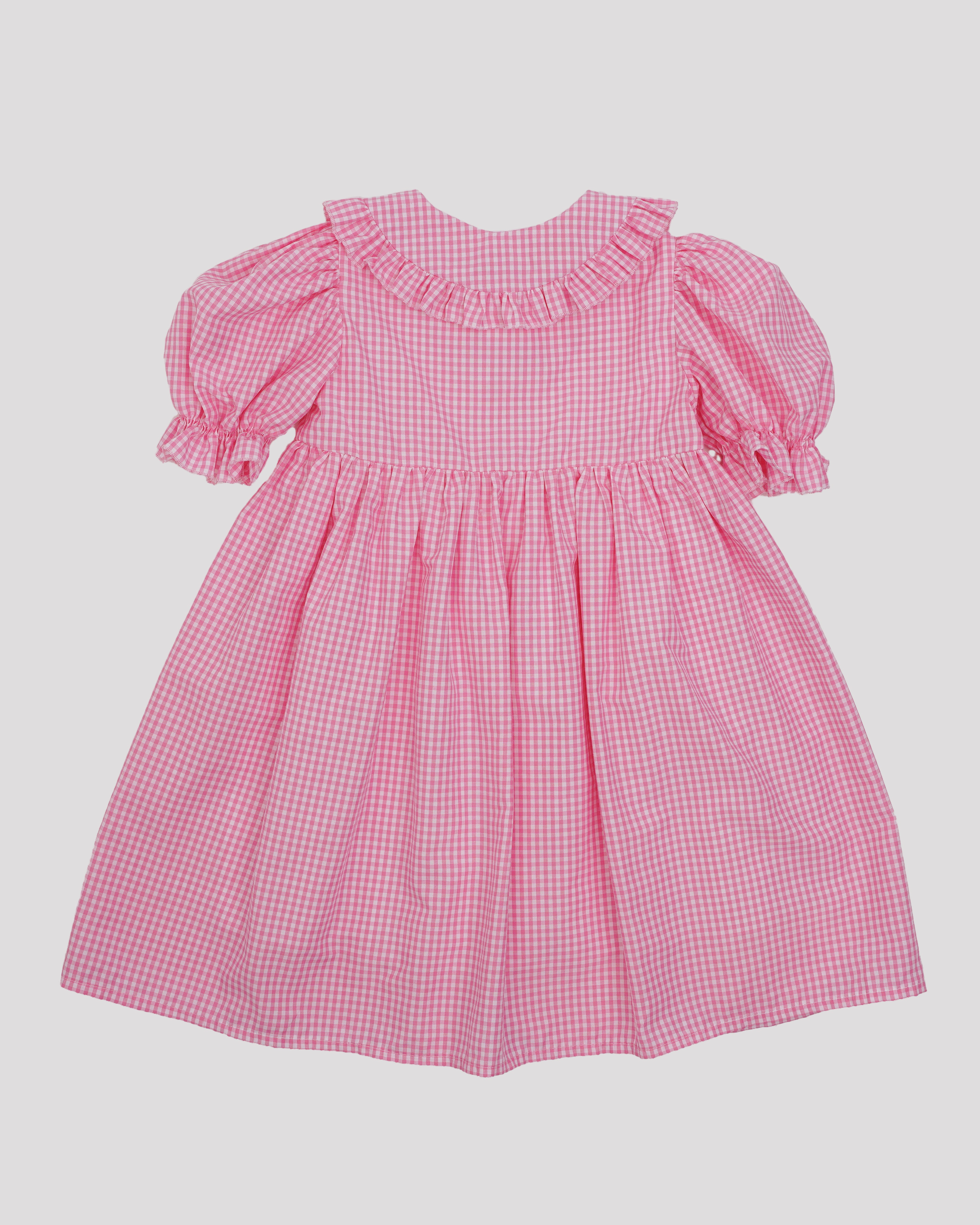 Rochie in carouri roz cu volane